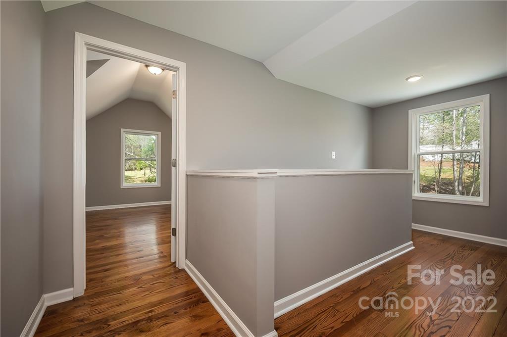 1141 Highway 64 Rutherfordton, NC 28139 - Photo 31 of 37 a view of hallway with window and wooden floor