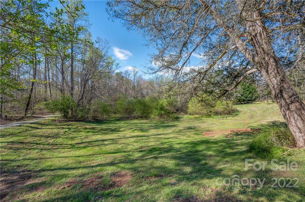 1141 Highway 64 Rutherfordton, NC 28139 - Photo 5 of 37 a view of a field with an trees