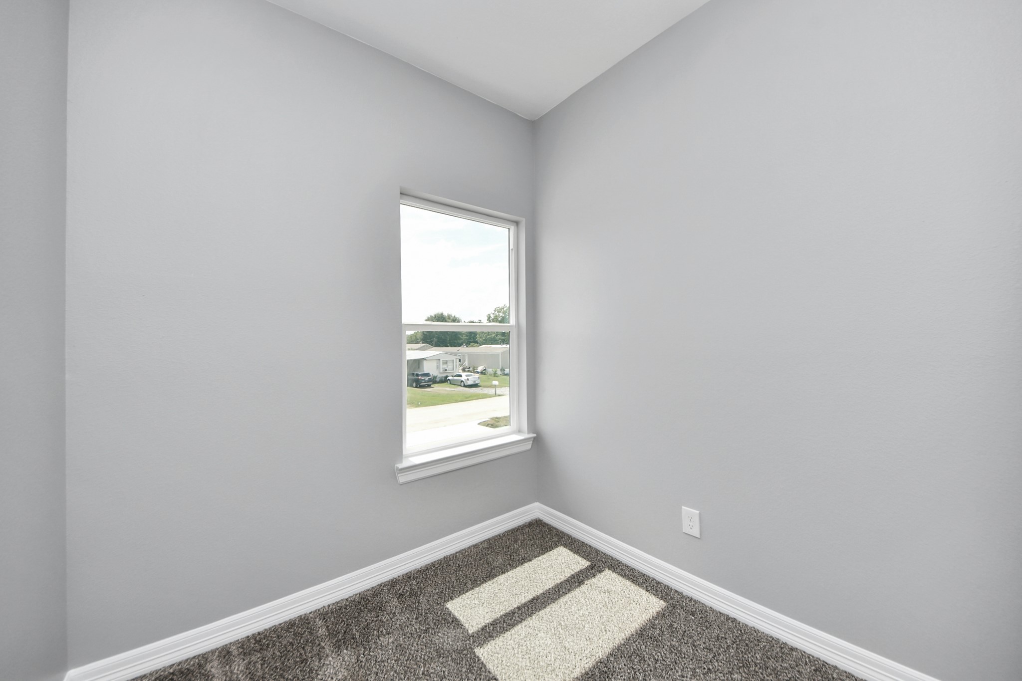 406 North 4th Street Beasley, TX 77417 - Photo 22 of 29 an empty room with a window