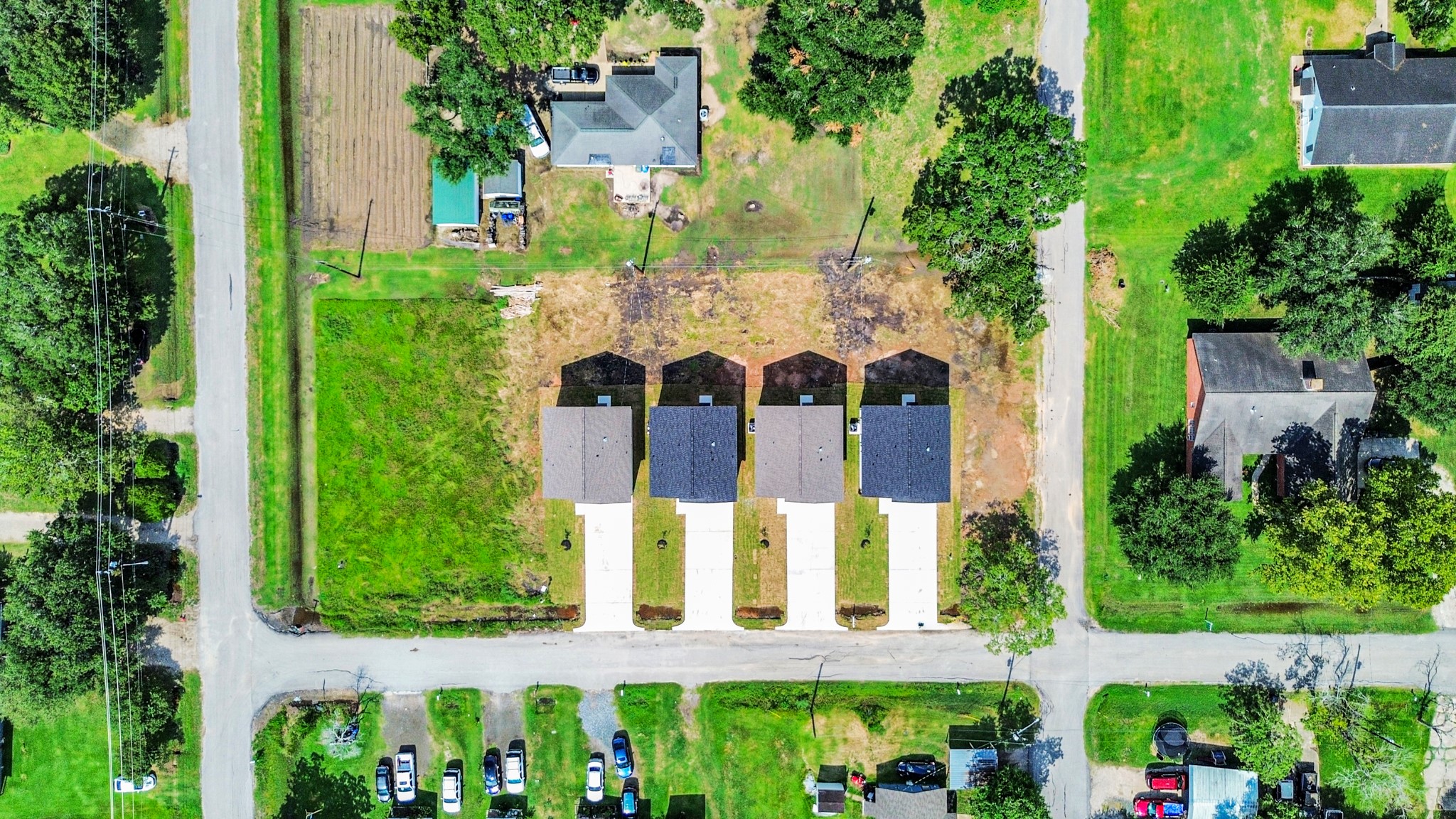 406 North 4th Street Beasley, TX 77417 - Photo 26 of 29 front view of a house with a lots of flower plants