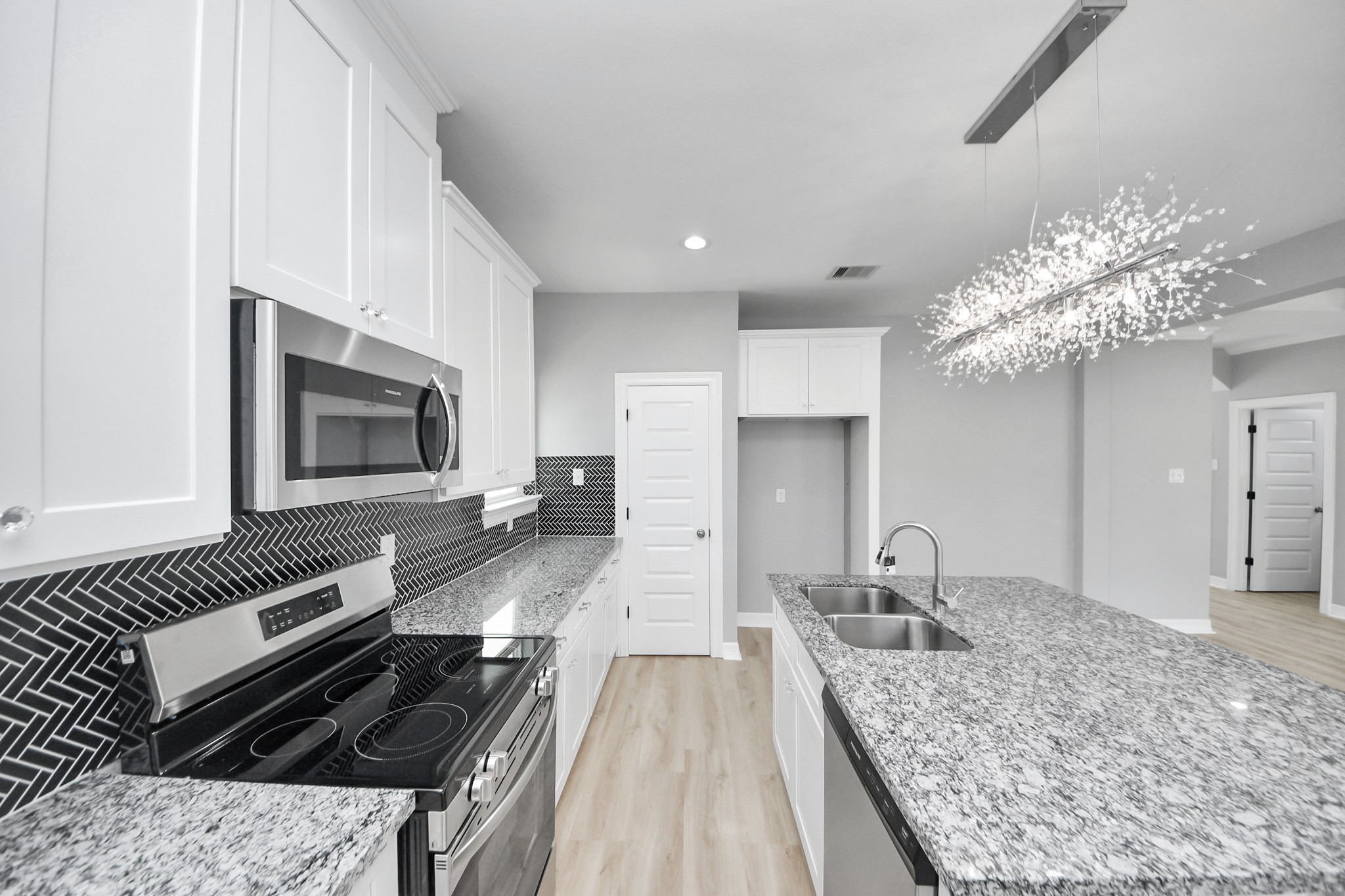 406 North 4th Street Beasley, TX 77417 - Photo 9 of 29 a kitchen with sink stove and refrigerator