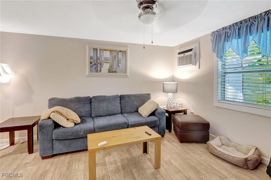 7462 Pentz Road Bokeelia, FL 33922 - Photo 12 of 22 a living room with furniture