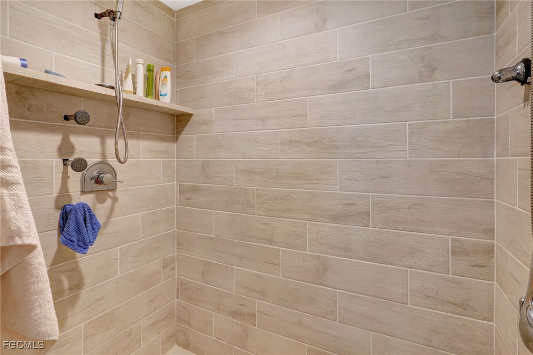 7462 Pentz Road Bokeelia, FL 33922 - Photo 16 of 22 a bathroom with a shower