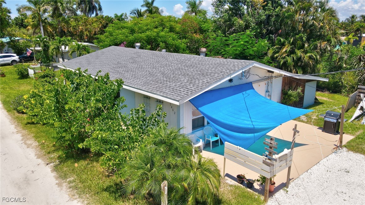 7462 Pentz Road Bokeelia, FL 33922 - Photo 2 of 22 an aerial view of a house