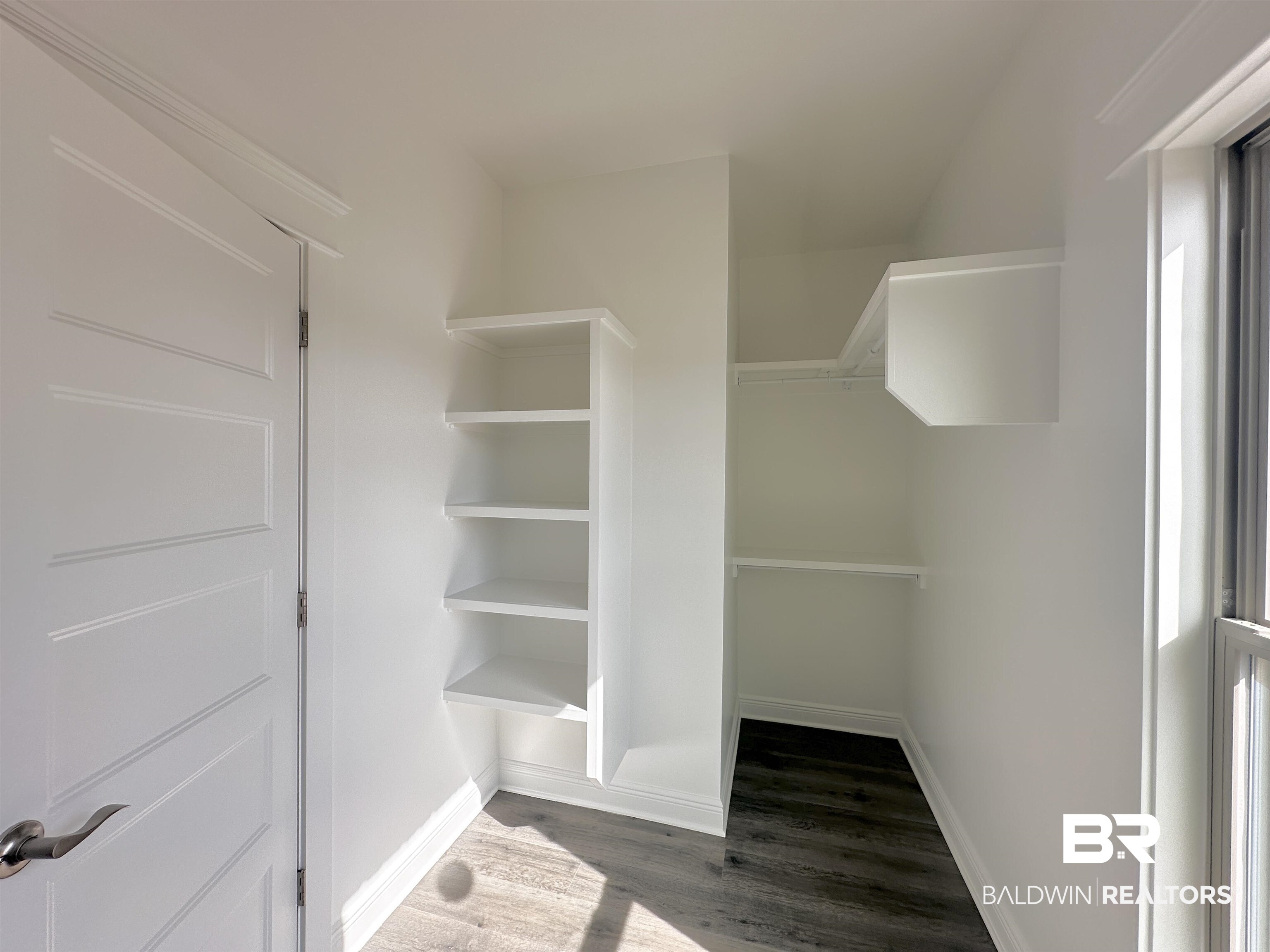 691 Kitfox Avenue Fairhope, AL 36532 - Photo 15 of 42 Spacious closet featuring hardwood / wood-style flooring
