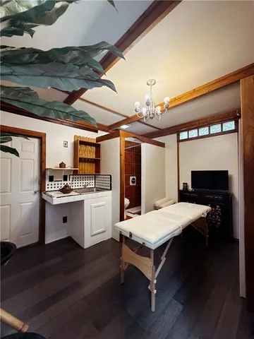 a open kitchen with a table and chairs