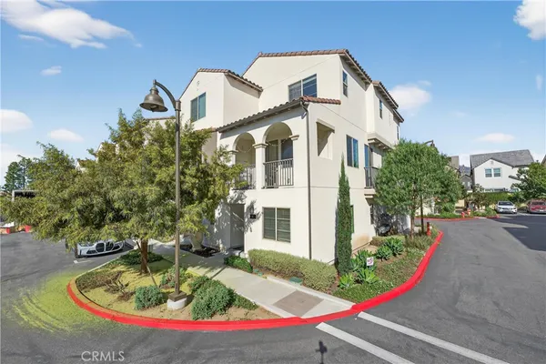 a house with swimming pool in front of it