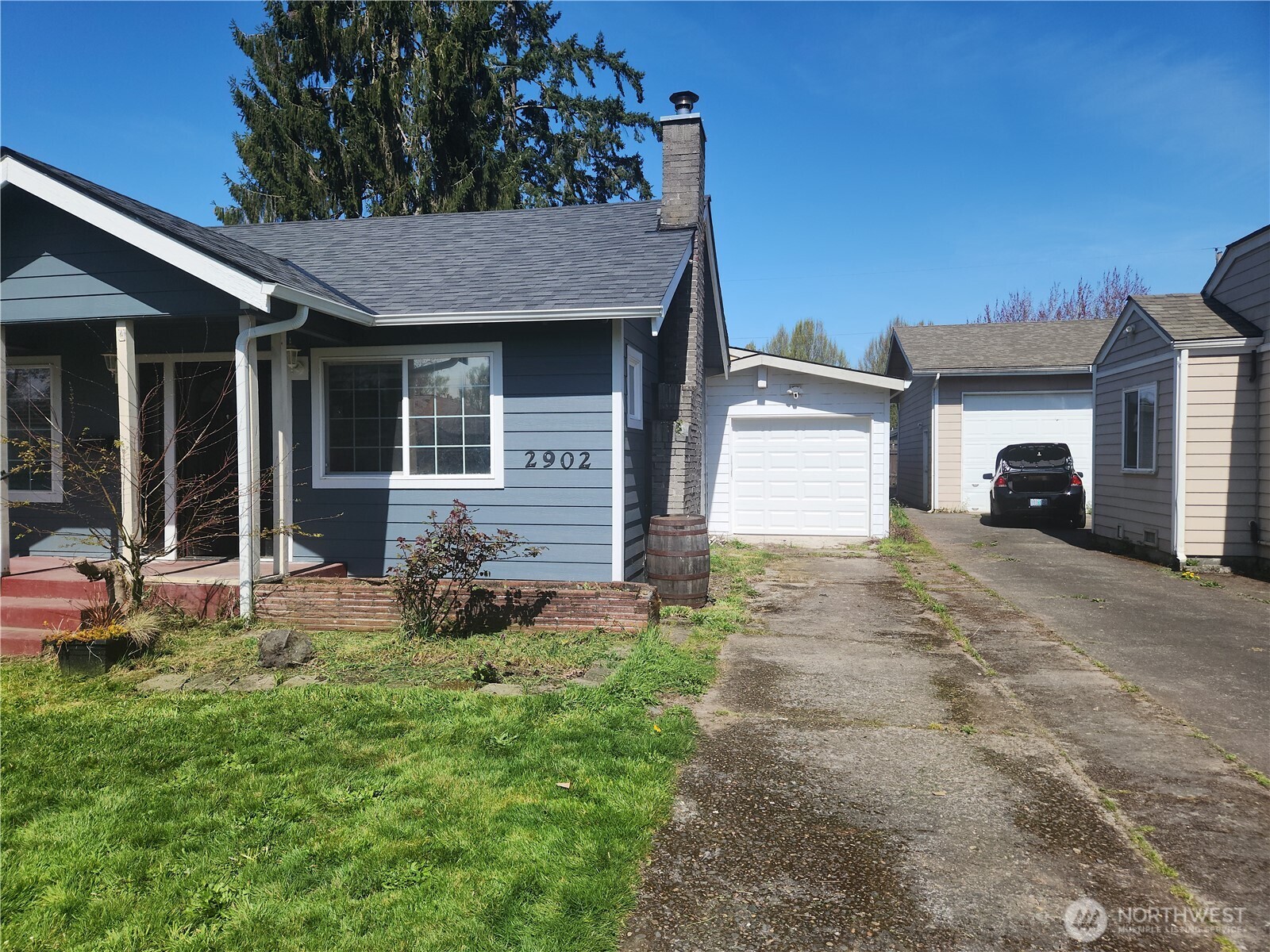 2902 Dover Street Longview, WA 98632 - Photo 3 of 23 a front view of a house with garden
