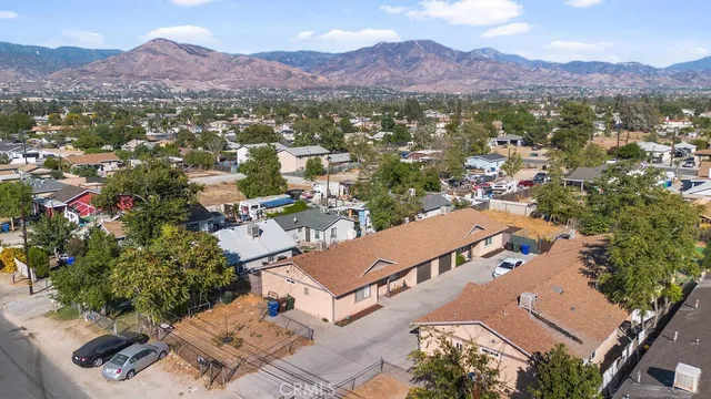 an aerial view of residential houses and outdoor space