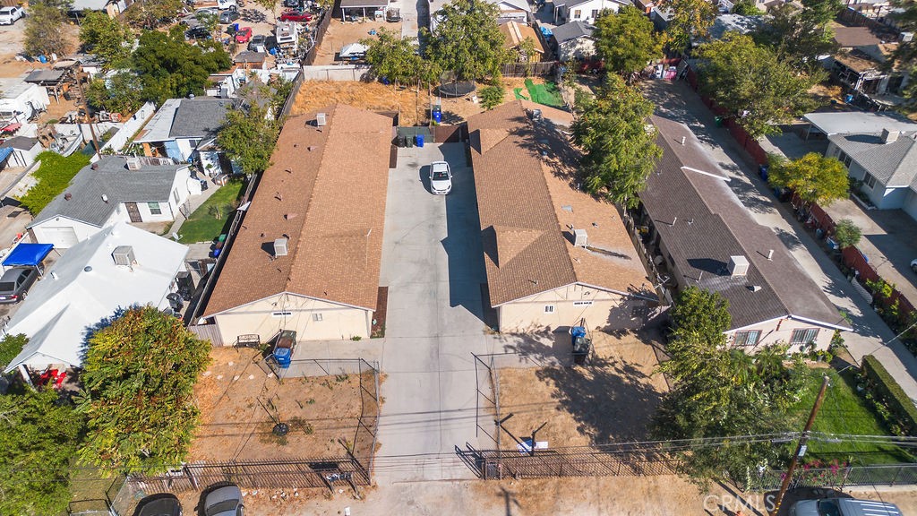 7771 McKinley Avenue Highland, CA 92410 - Photo 16 of 22 an aerial view of residential houses with outdoor space