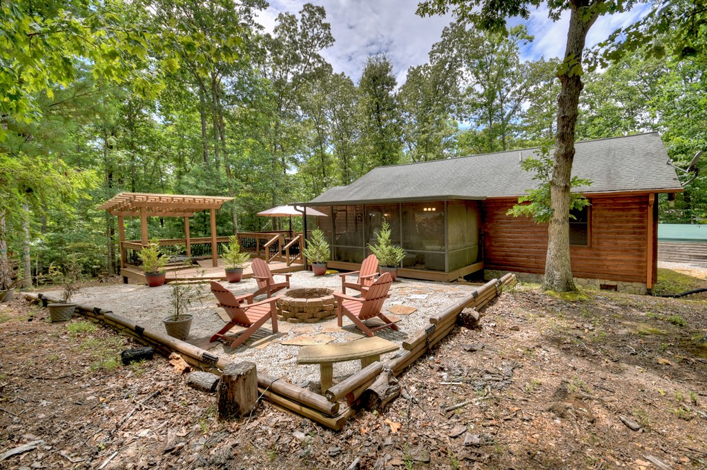1044 Boulder Crk Road Murphy, NC 28906 - Photo 7 of 38 a view of backyard of house with seating space