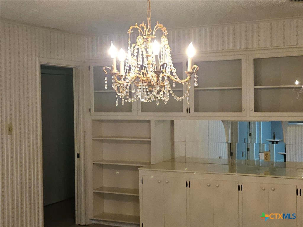 601 North Rhomberg Street Burnet, TX 78611 - Photo 12 of 42 a view of a chandelier in small space
