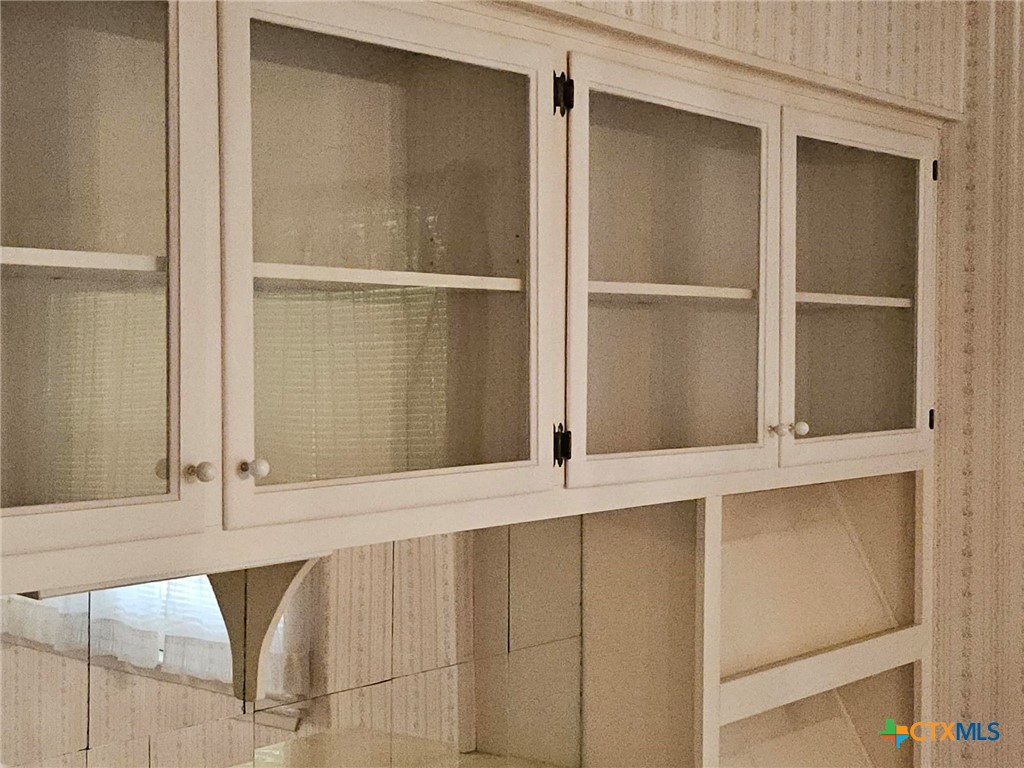 601 North Rhomberg Street Burnet, TX 78611 - Photo 13 of 42 a view of an empty room with cabinet