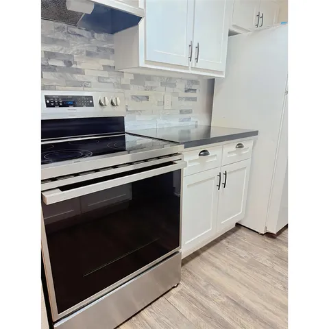 a view of a swimming pool and a terrace