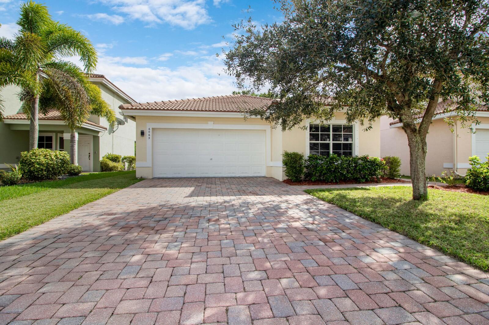 6063 Adriatic Way Greenacres, FL 33413 - Photo 1 of 33 Front Exterior