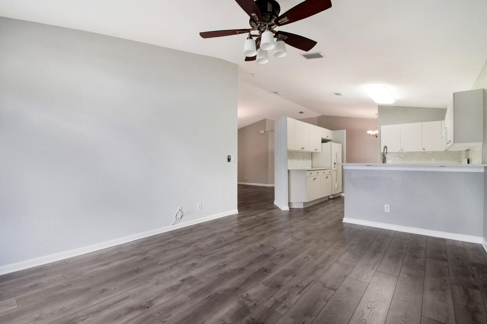 6063 Adriatic Way Greenacres, FL 33413 - Photo 13 of 33 Family Room to Kitchen