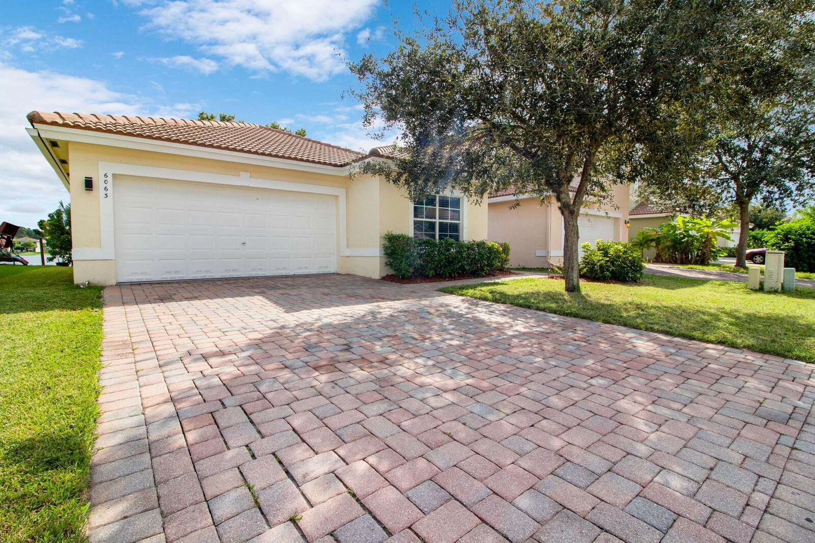 6063 Adriatic Way Greenacres, FL 33413 - Photo 2 of 33 Front Exterior