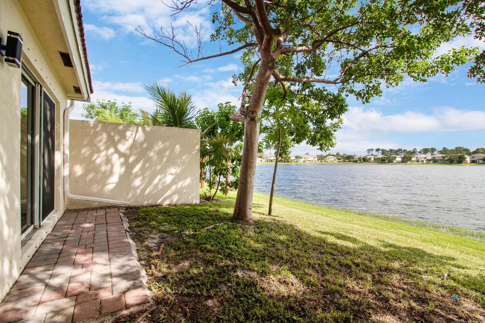 6063 Adriatic Way Greenacres, FL 33413 - Photo 30 of 33 Back Patio