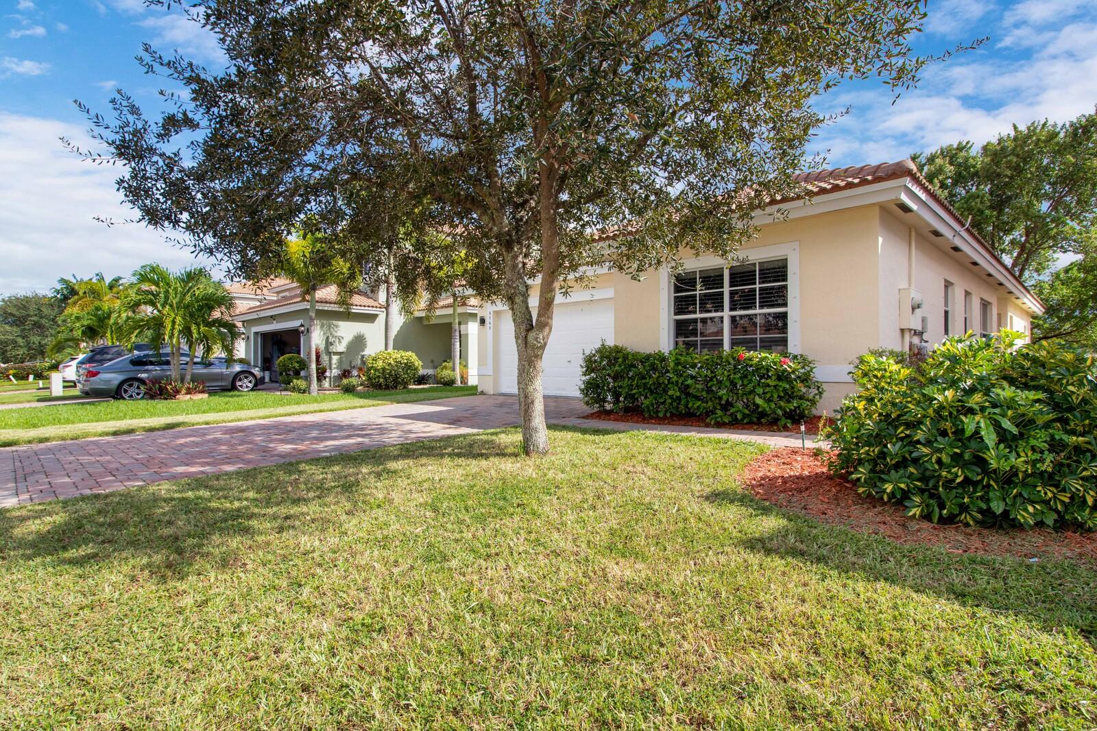 6063 Adriatic Way Greenacres, FL 33413 - Photo 3 of 33 Front Exterior