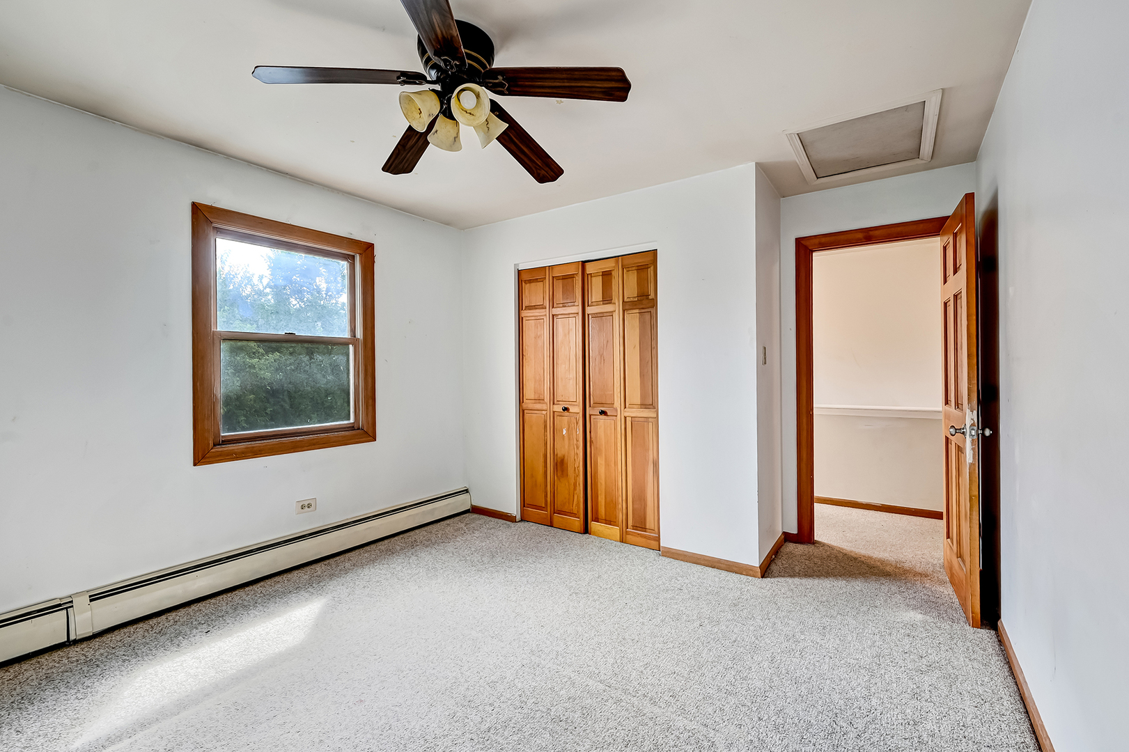 3007 Lincoln Road Oak Brook, IL 60523 - Photo 17 of 25 a view of livingroom with window and ceiling fan