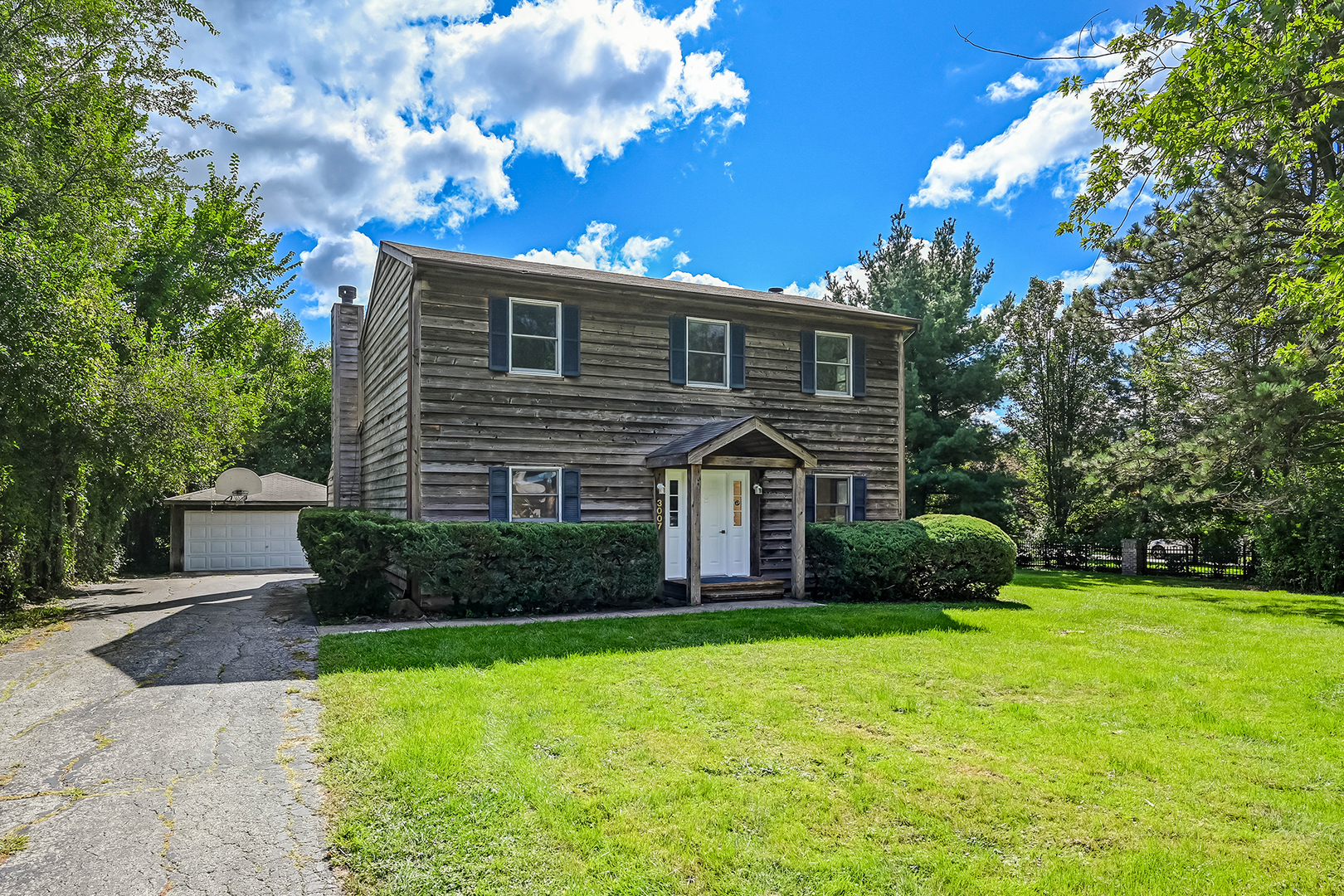 3007 Lincoln Road Oak Brook, IL 60523 - Photo 2 of 25 a front view of house with yard and green space