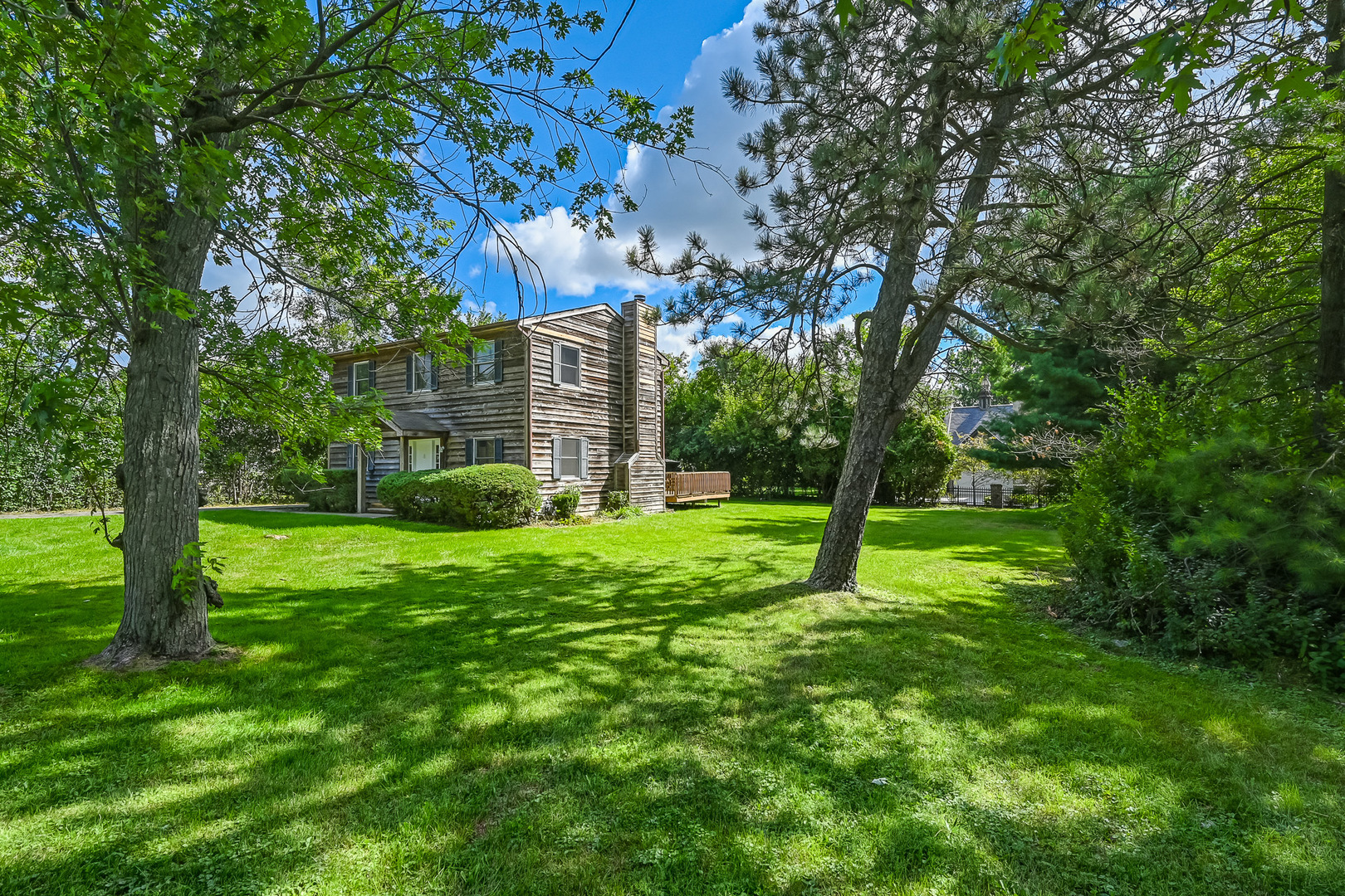 3007 Lincoln Road Oak Brook, IL 60523 - Photo 3 of 25 a green field with lots of trees in it