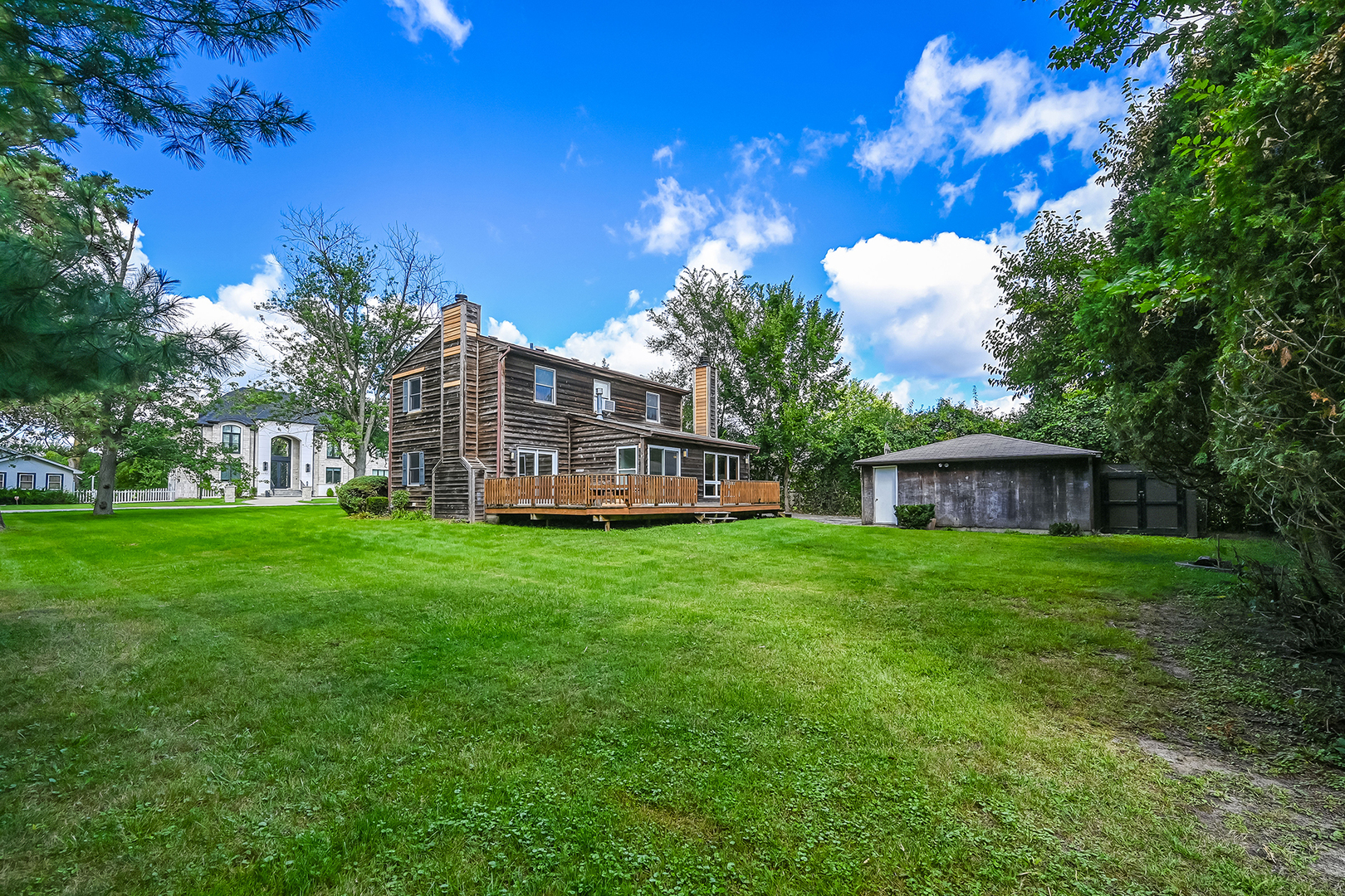 3007 Lincoln Road Oak Brook, IL 60523 - Photo 4 of 25 a view of a house with backyard and a tree