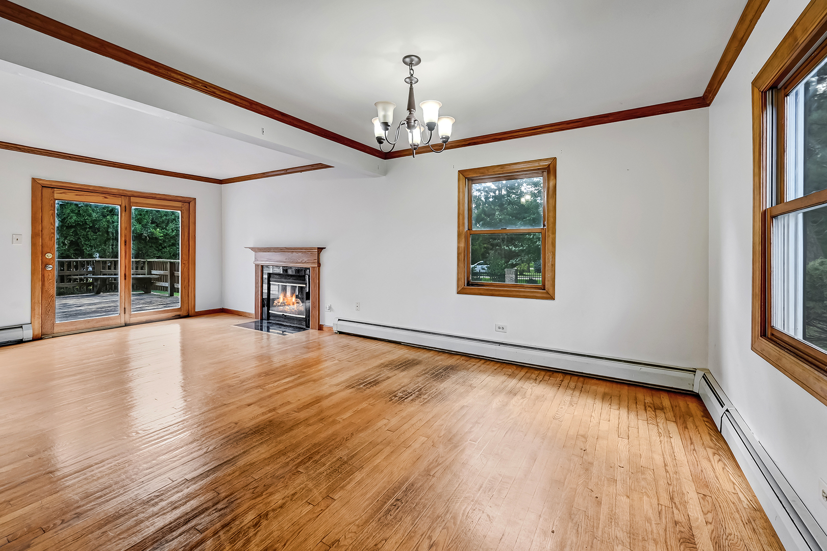3007 Lincoln Road Oak Brook, IL 60523 - Photo 6 of 25 wooden floor in an empty room with a window