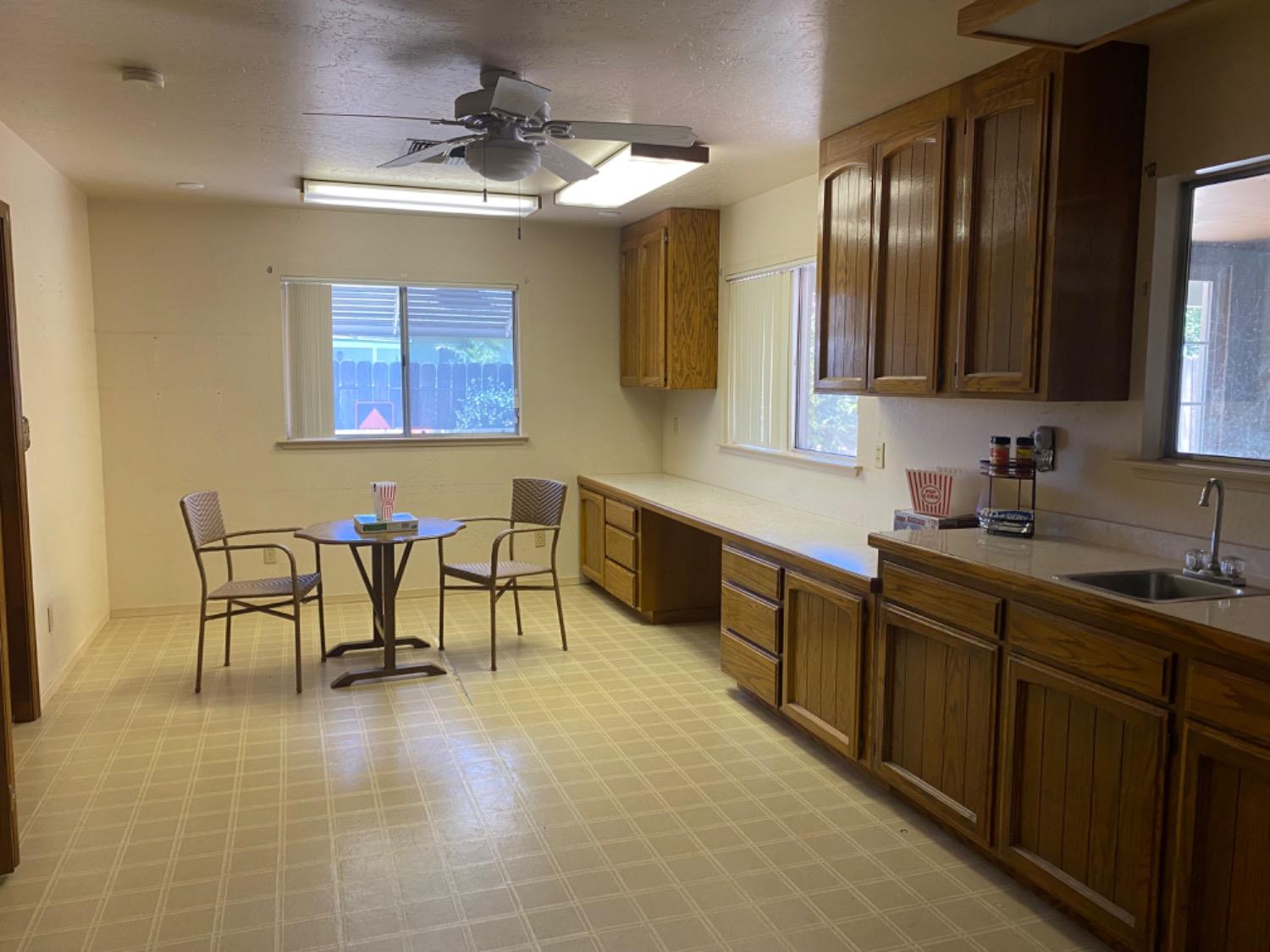 1712 Bundy Avenue Clovis, CA 93611 - Photo 9 of 9 a spacious bathroom with a double vanity sink and a mirror