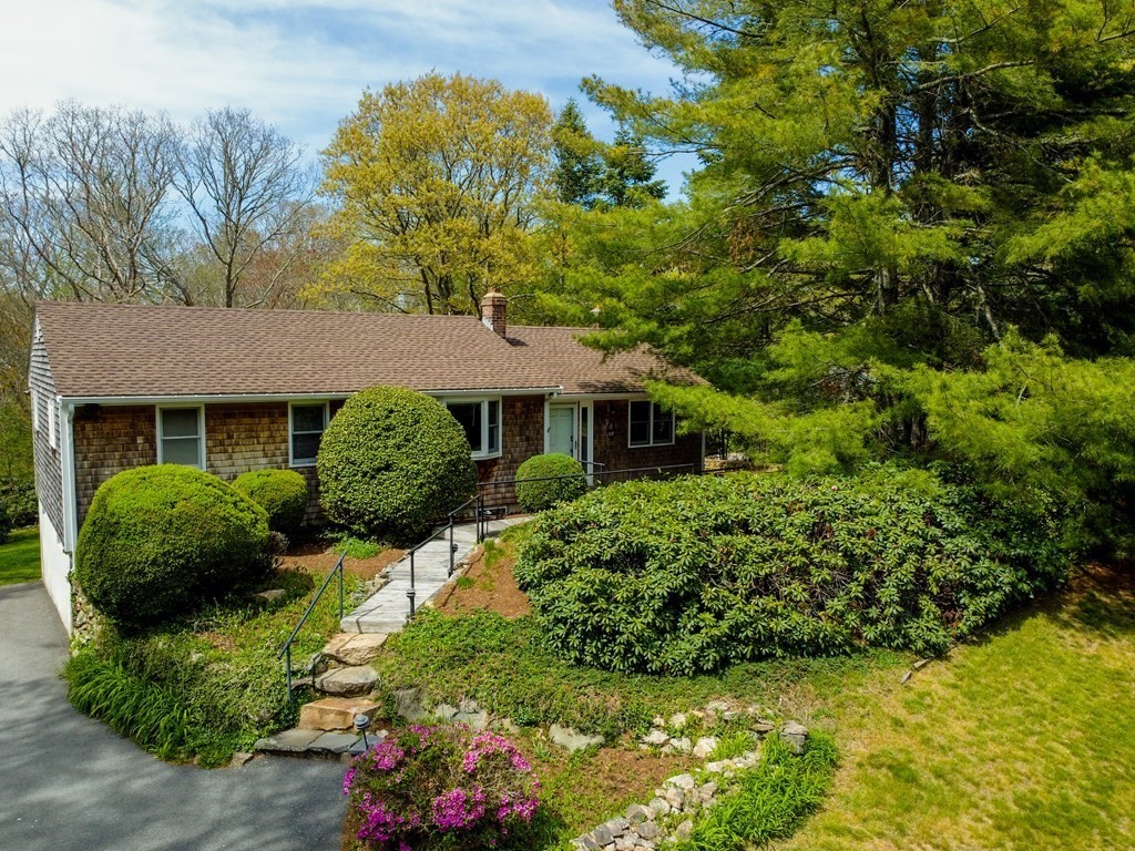 117 Rock O'Dundee Road Dartmouth, MA 02748 - Photo 1 of 24 a front view of a house with a yard