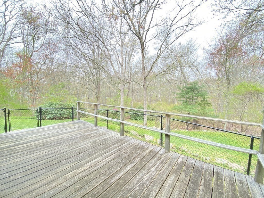 117 Rock O'Dundee Road Dartmouth, MA 02748 - Photo 11 of 24 a view of swimming pool with a yard and trees