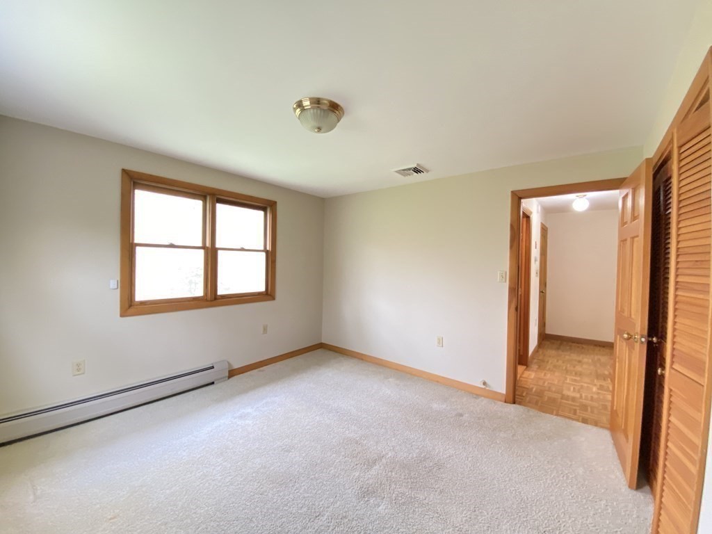 117 Rock O'Dundee Road Dartmouth, MA 02748 - Photo 16 of 24 an empty room with windows