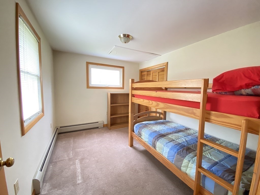 117 Rock O'Dundee Road Dartmouth, MA 02748 - Photo 17 of 24 a bedroom with a bed and a window