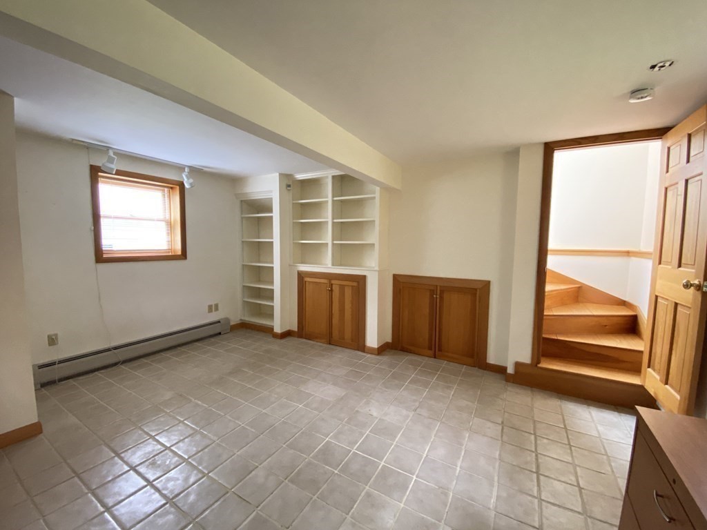 117 Rock O'Dundee Road Dartmouth, MA 02748 - Photo 20 of 24 an empty room with windows