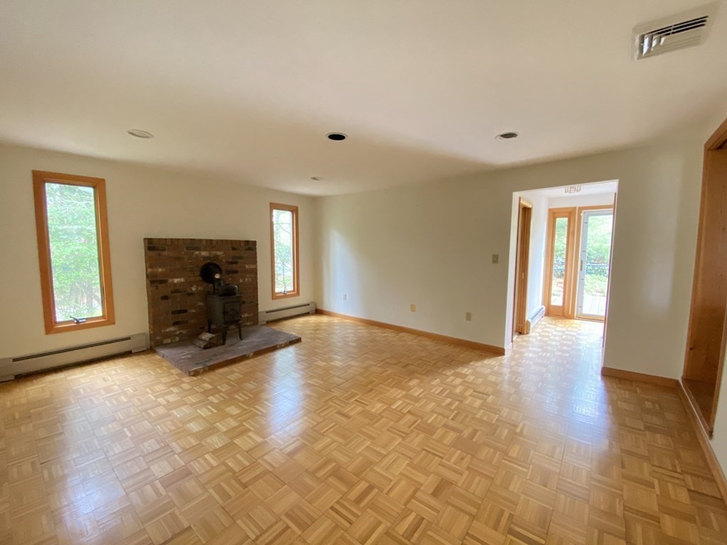 117 Rock O'Dundee Road Dartmouth, MA 02748 - Photo 2 of 24 a view of a livingroom with a fireplace
