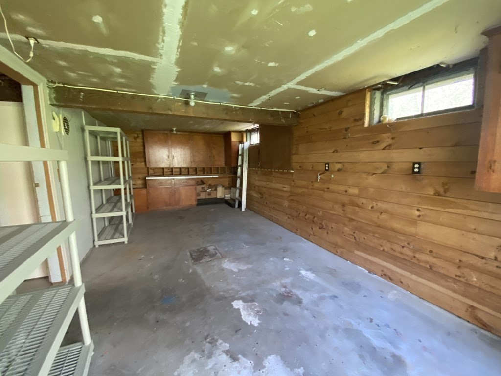 117 Rock O'Dundee Road Dartmouth, MA 02748 - Photo 23 of 24 a view of a hallway with wooden shelves