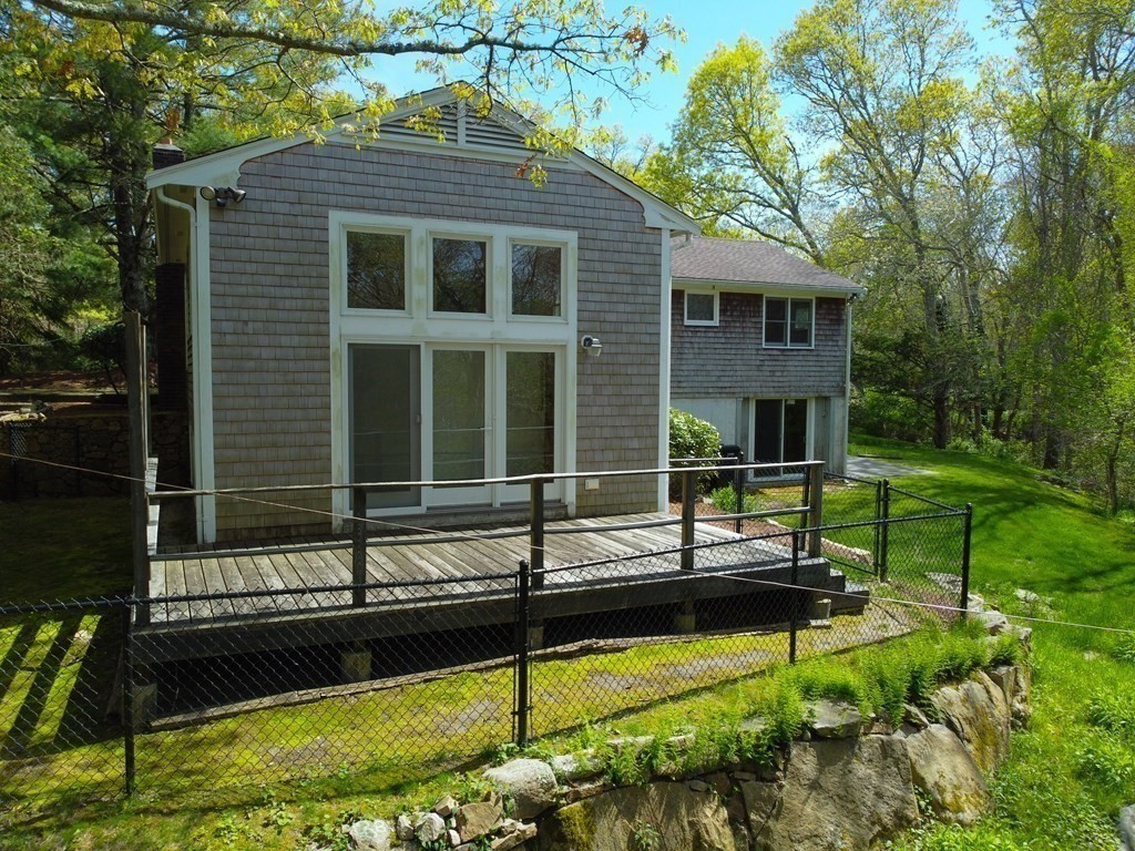 117 Rock O'Dundee Road Dartmouth, MA 02748 - Photo 6 of 24 a view of house with backyard and swimming pool