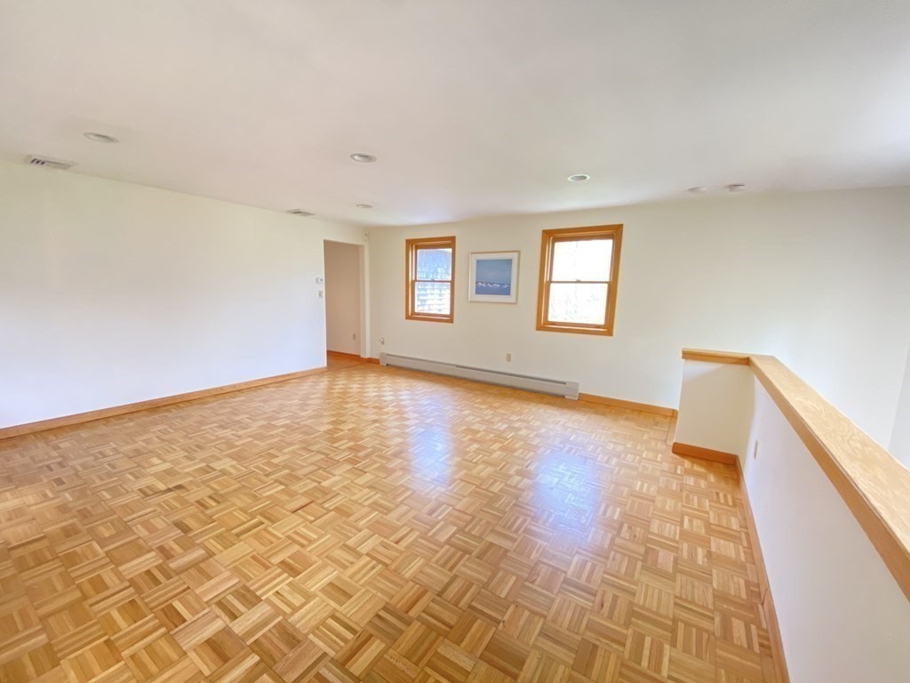 117 Rock O'Dundee Road Dartmouth, MA 02748 - Photo 9 of 24 wooden floor in an empty room with a window