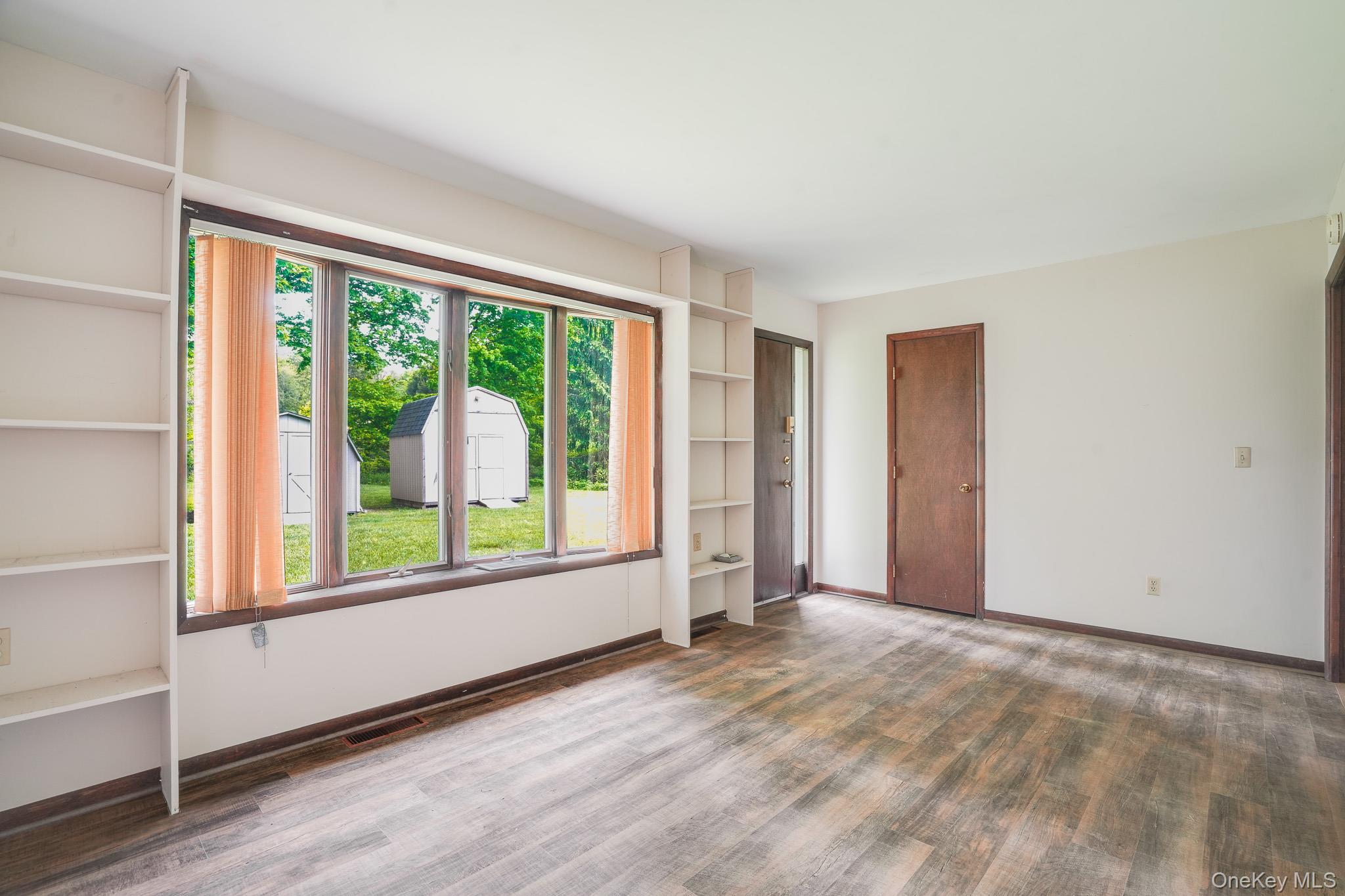84 Sleight-Plass Road Poughkeepsie, NY 12603 - Photo 11 of 30 a view of an empty room with a window