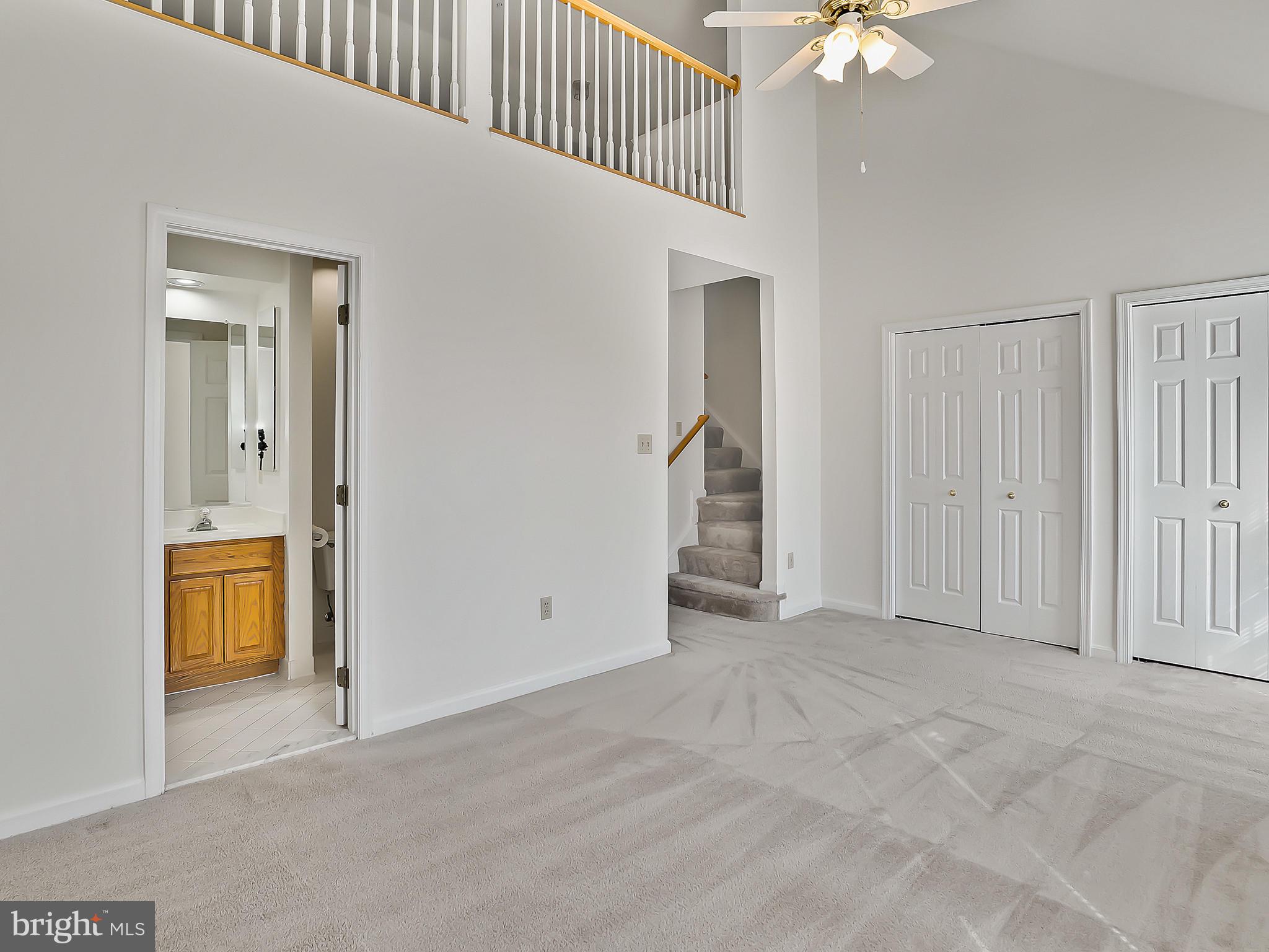 16820 Centerfield Way Olney, MD 20832 - Photo 23 of 48 Master Bedroom with Wall of Closets
