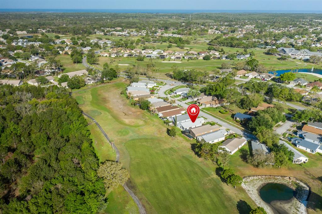 11718 Wheatfield Loop Hudson, FL 34667 - Photo 67 of 88 an aerial view of residential houses with outdoor space