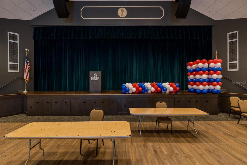 11718 Wheatfield Loop Hudson, FL 34667 - Photo 79 of 88 a outdoor dining space with furniture and flowers