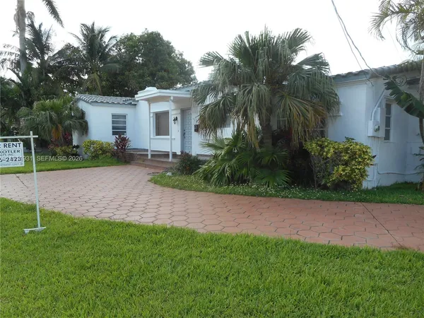 a view of a backyard with a garden