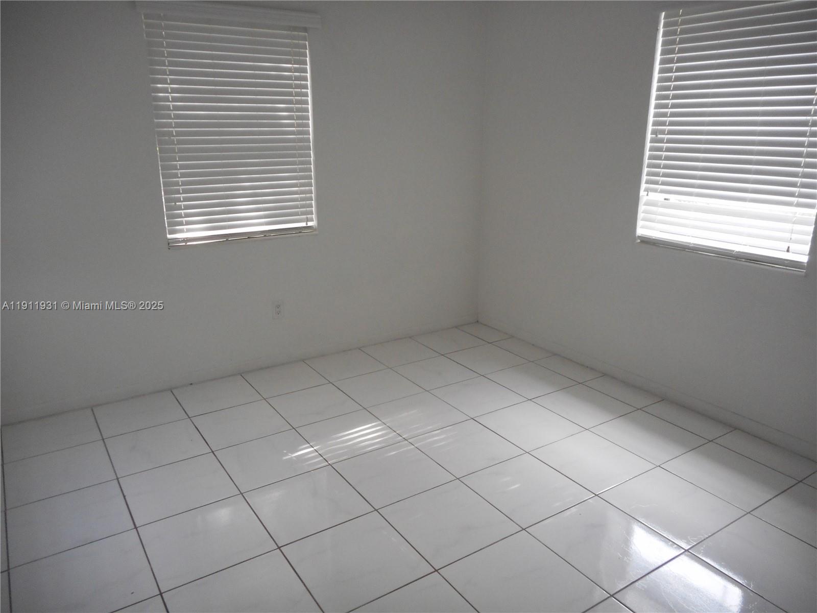 420 88th Street Surfside, FL 33154 - Photo 17 of 19 a view of room and window