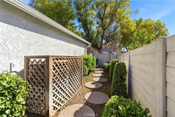 a backyard of a house with lots of green space