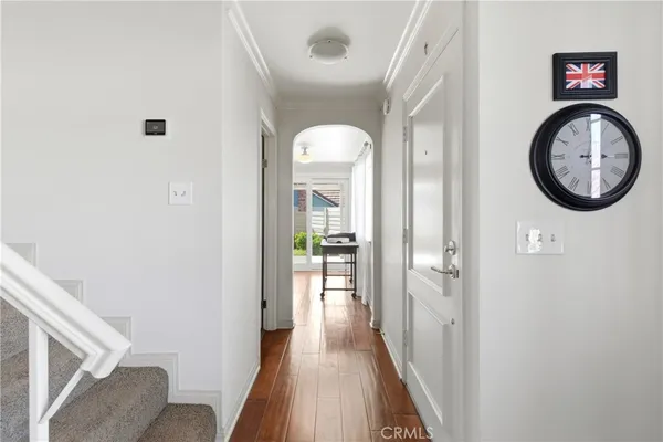 a view of a hallway with windows