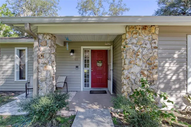 a front view of a house with a garage