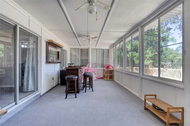 a room with furniture and a window