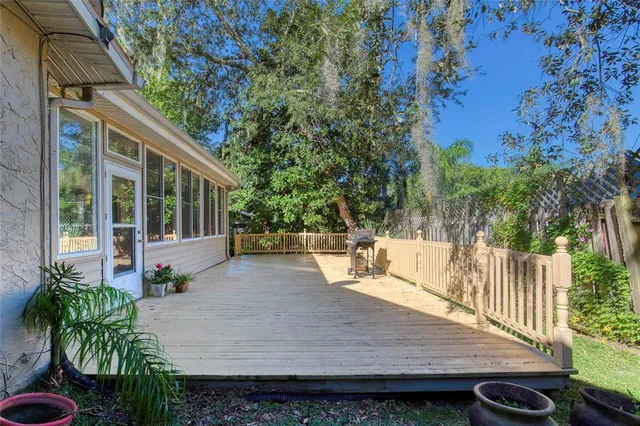 swimming pool view with a seating space