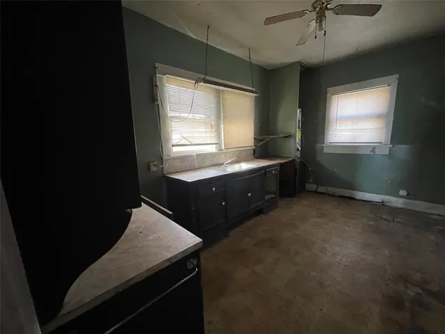 a room with painting and a table